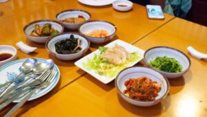 Banchan with Cabbage Kimchi (lower right) and Mandu Dumplings at Koreana Restaurant