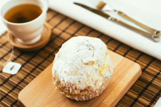 Ensaymada, decadent Filipino brioche bun.