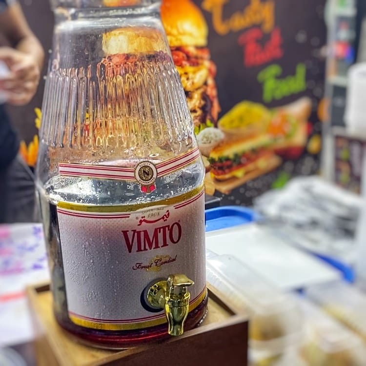 Large glass bottle used at Vimto