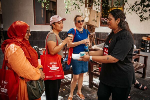 Guide explaining Karak Chai - Dubai Souks and Creekside Food Walk